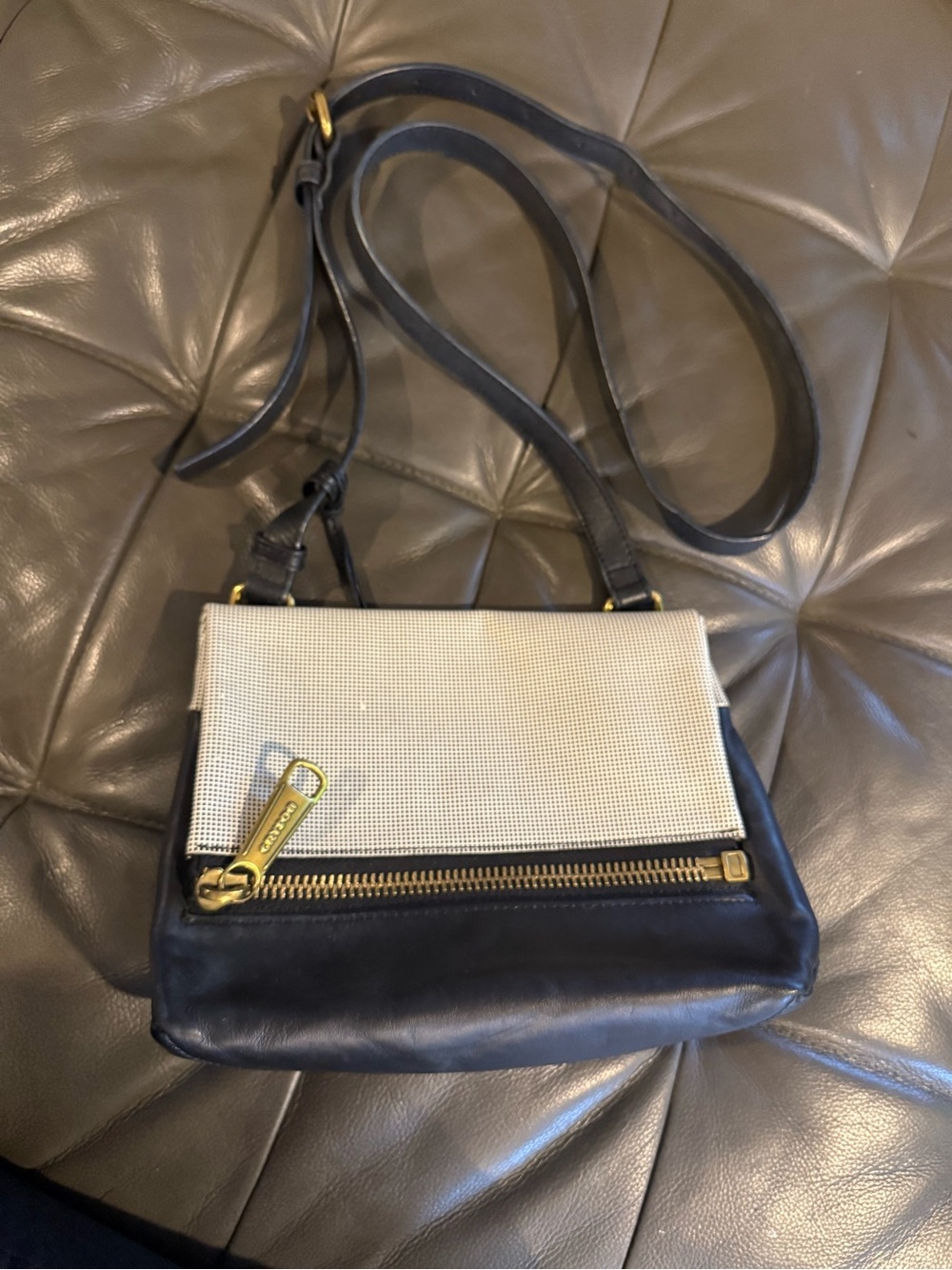 Two-Tone Black and Cream Crossbody Bag with Gold Accent Hardware